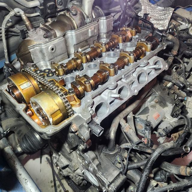 Engine with camshafts exposed